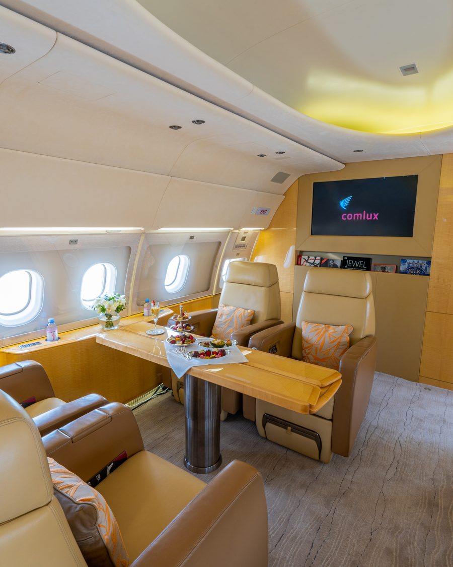 Interior of a Comlux private jet cabin.